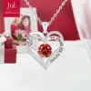 Collana in oro bianco con diamanti rossi