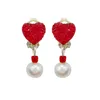 Fine diamond earrings - bright red