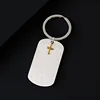 Silver key ring with gold cross
