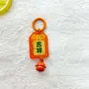 Anillo de resorte naranja auspicioso acrílico 17 campana