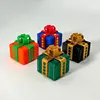 Caja de regalo molesta 8cm - Verde navideño + dorado