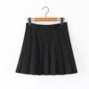 Black pleated mini skirt