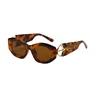 Tortoiseshell frame-gradient tea-colored lens