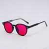 Black with red lens