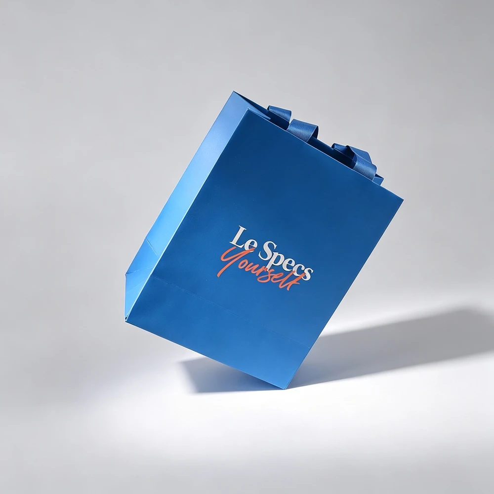 Hot Sale Custom Printing and Logo Waterproof Matte Laminated Coated Paper Gift Bag with Ribbon Handle