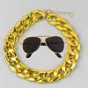 Collier Lunettes de soleil Noir