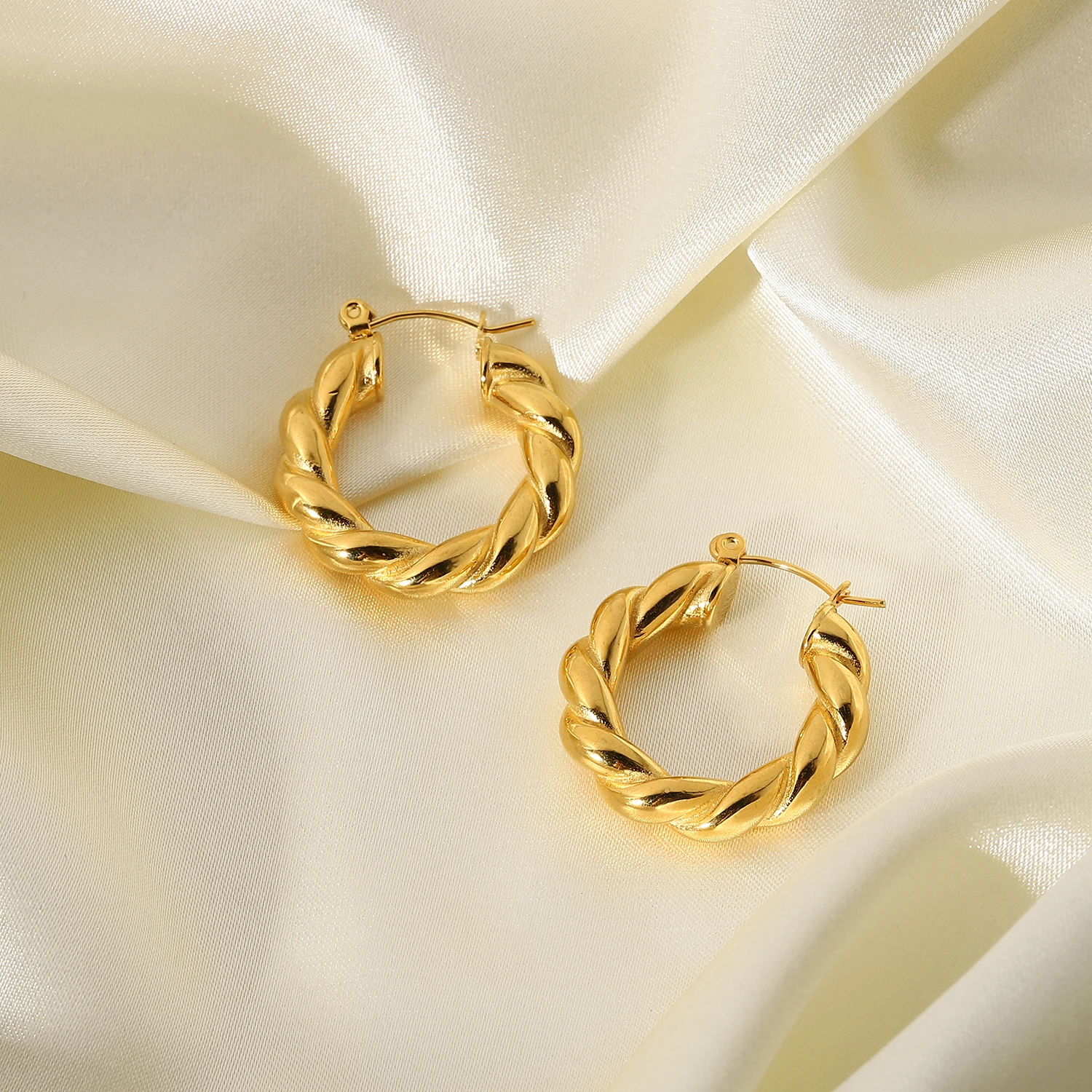 Waterproof twist popular gold plated earrings