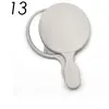 white round handheld mirror