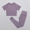 Maglia viola a maniche corte+leggings