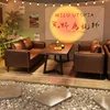 A table with two double sofas