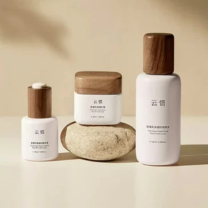 Advanced Personalized Customized Walnut Cap Cosmetic Glass Bottle Set New Mold Glass Bottle for Highly Demanding Customers