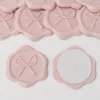 Nouveau nœud gaufré rose nude.