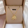 Colgante de cobre con cadena de acero titanio F121