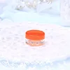 clear jar with orange cap