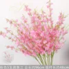 Branche d'orchidée dansante rose à 5 branches