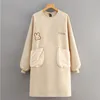 Soft and feminine rabbit smock in beige
