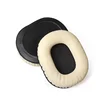 1 almohadilla de cuero proteico color beige con malla negra.