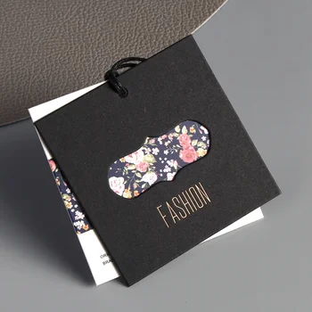 Custom Clothing hang Tag With String Embossed LOGO Gold Foil UV Printing Cardboard Paper hang Tag for Garment