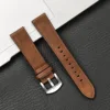 boucle argentée à bande marron