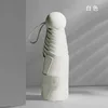 Parapluie capsule à 6 os-blanc