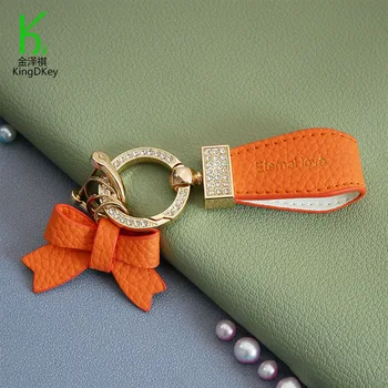 MECCANIXITY Portachiavi Con Fiocco In Pelle PU: L'accessorio Cheerleader Per Borse, Zaini E Chiavi, Regalo Simpatico E Originale.