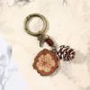 1703 Blood Vine Snowflake Pine include ornamento da appendere