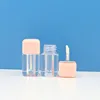 Transparent tube with pink cap