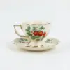 Cup with saucer