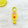 Anillo de resorte amarillo campana acrílica saludable 17