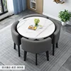 Mesa redonda estampada + silla de cuero gris oscuro