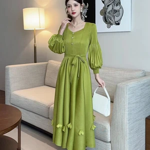 New Large-sized Elegant Dress with Ruffled Sleeves and a Belt at the Waist, Featuring Decorative Pleated Hem.