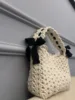 Leya bag beige with black ribbon