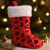 Red christmas stocking with sequins