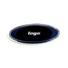 Insignia azul + logo plateado