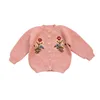 Cardigan rosa fatto a mano all'uncinetto