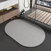 New generation of diatomaceous earth bathroom mats - natural oval gray