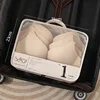 Borsa beige piccola per biancheria intima