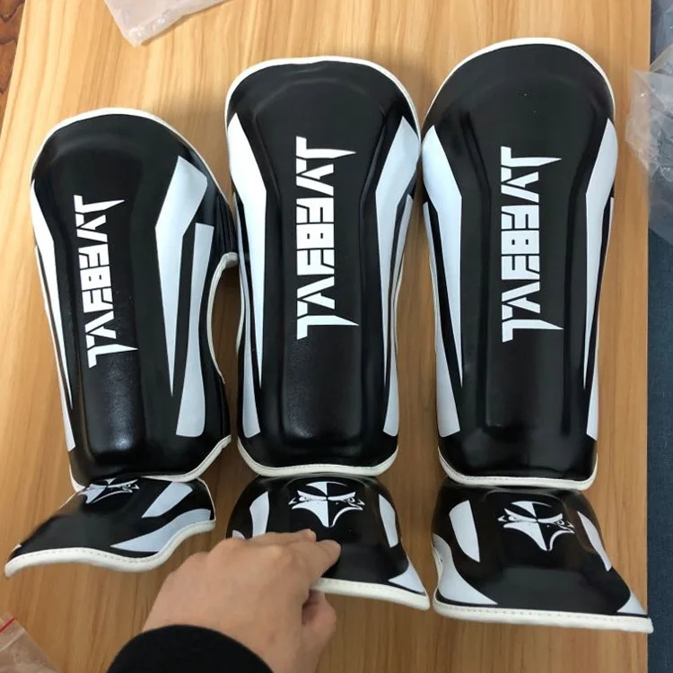 Индивидуальные защитные накладки на голени muay thai, боксерские защитные накладки на голени для ММА