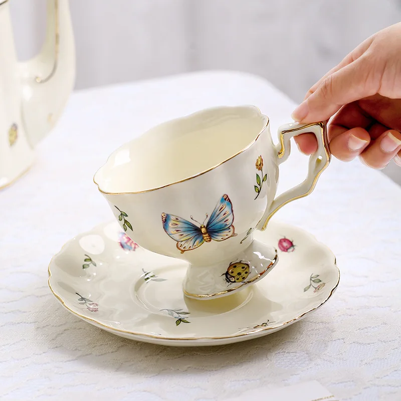 French court style coffee cup with gold rim ceramic European English afternoon teapot and tea coffee cup saucer