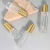 Transparent Bottle+ Gold Nozzle