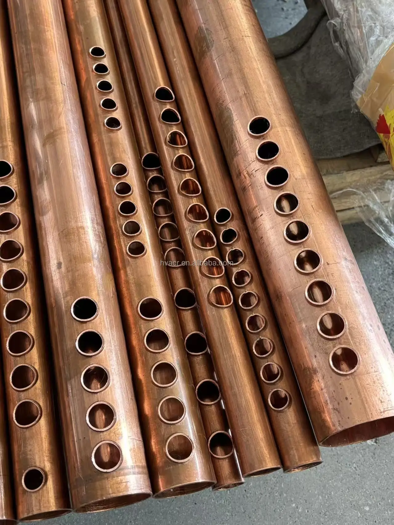 BOBO Machine copper tube hole pipe punching machine for solar shown in a detail photo for this news article