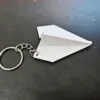 Llavero de avión de papel - blanco