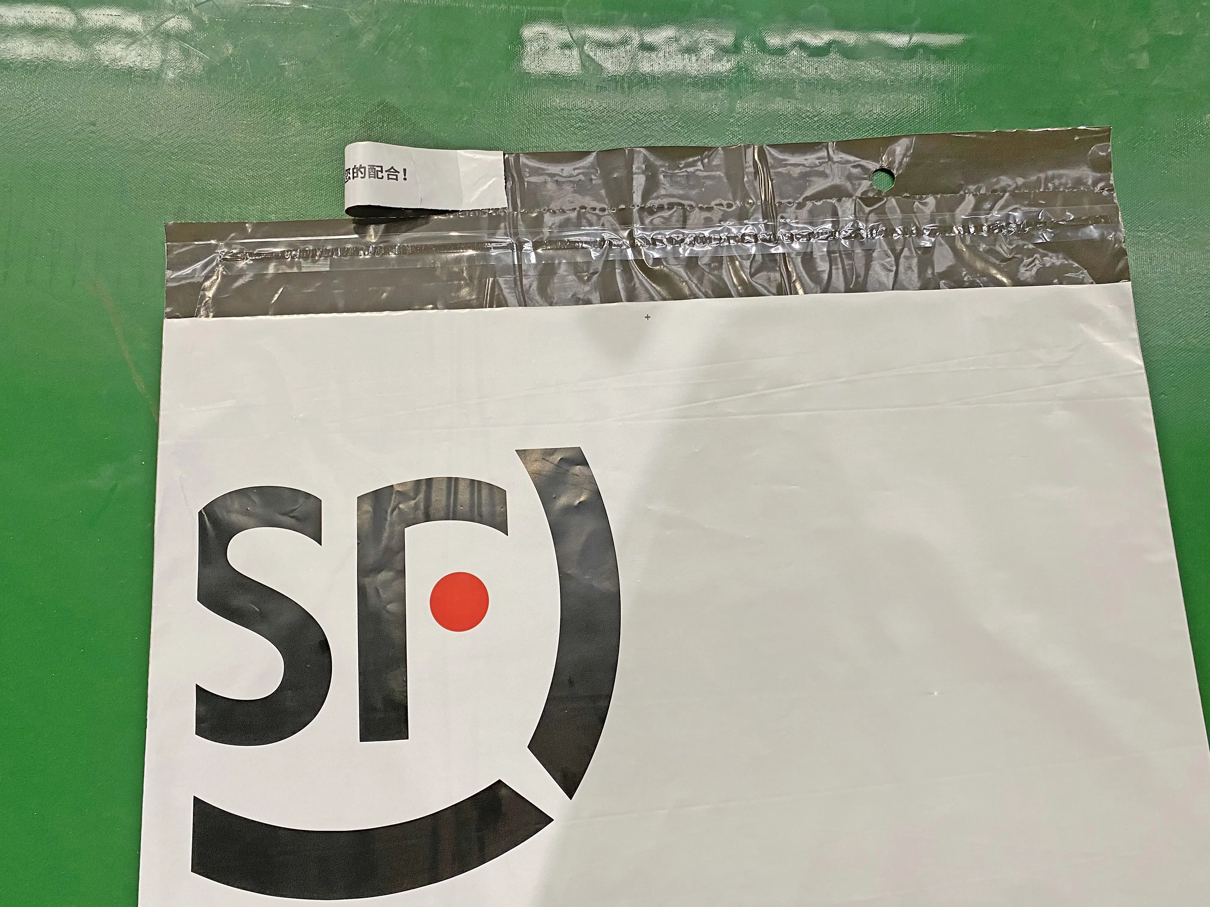 Fully Automatic PE HDPE Biodegradable Self Sealing Poly DHL Express Courier Mailer Plastic Bag Making Machine Manufacturer