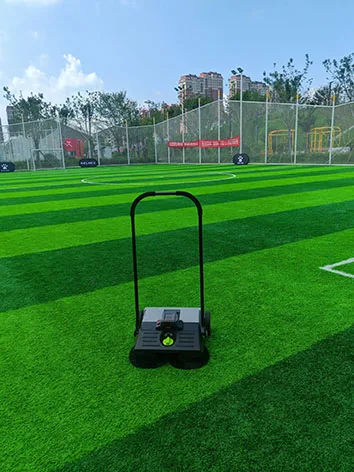New Wireless Walk-Behind Artificial Turf Sweeper Manual Floor Cleaning Tool with Plastic Brush for Street Use