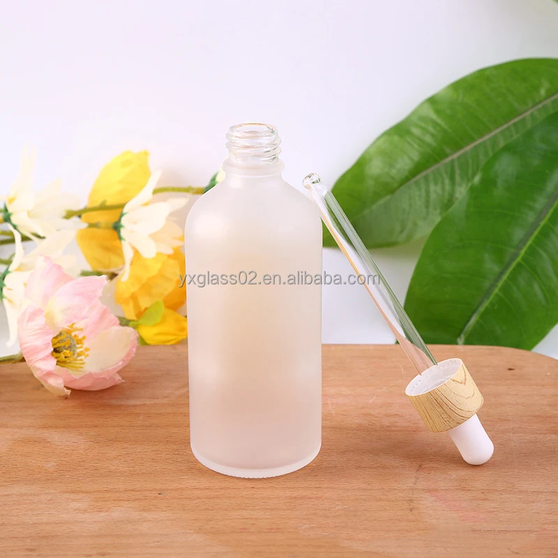 Frosted Essential Oil glass bottle serum glass bottle Flat Shoulder Dropper bottle with Plastic environmentally wood grain ring supplier