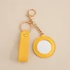 Yellow round mirror
