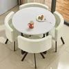 All white leather dining set with table and four chairs