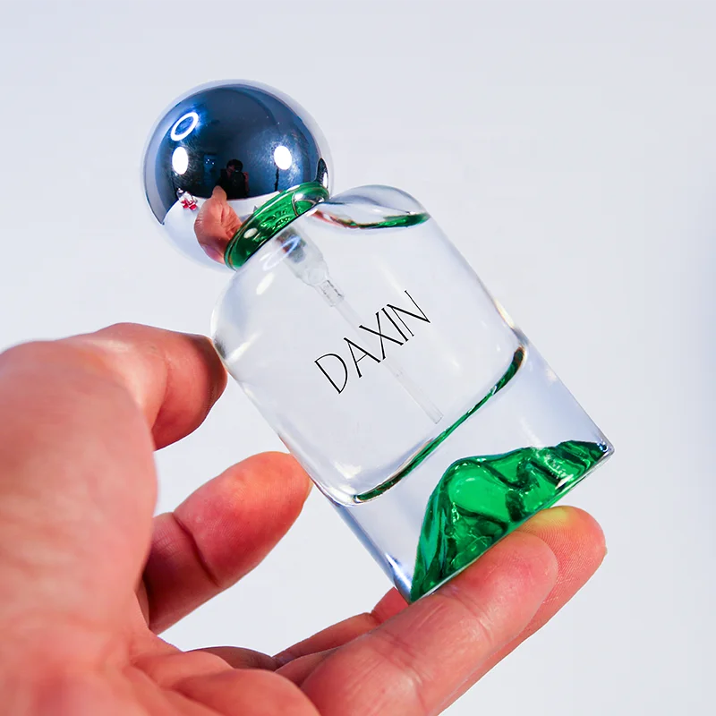OEM/ODM 30ml 50ml 100ml Cylinder Glass Perfume Bottles with Gold Silver Blue Red Green Bottom for Gift Fragrance