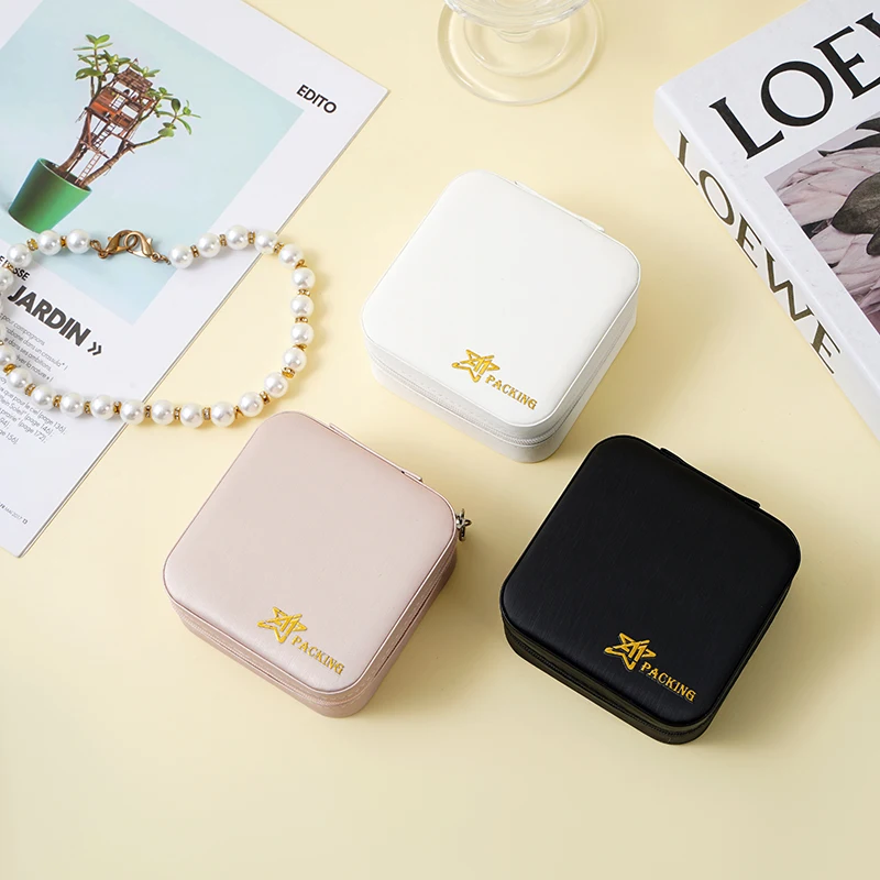 Minimalist jewelry storage shown with organized jewelry