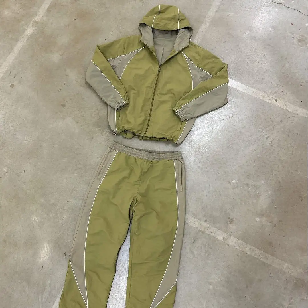Designers højkvalitets tracksuits i nylon/bomuld til streetstyle – tilpasbare med luftpudsning, tryk, strasssten og andre designs